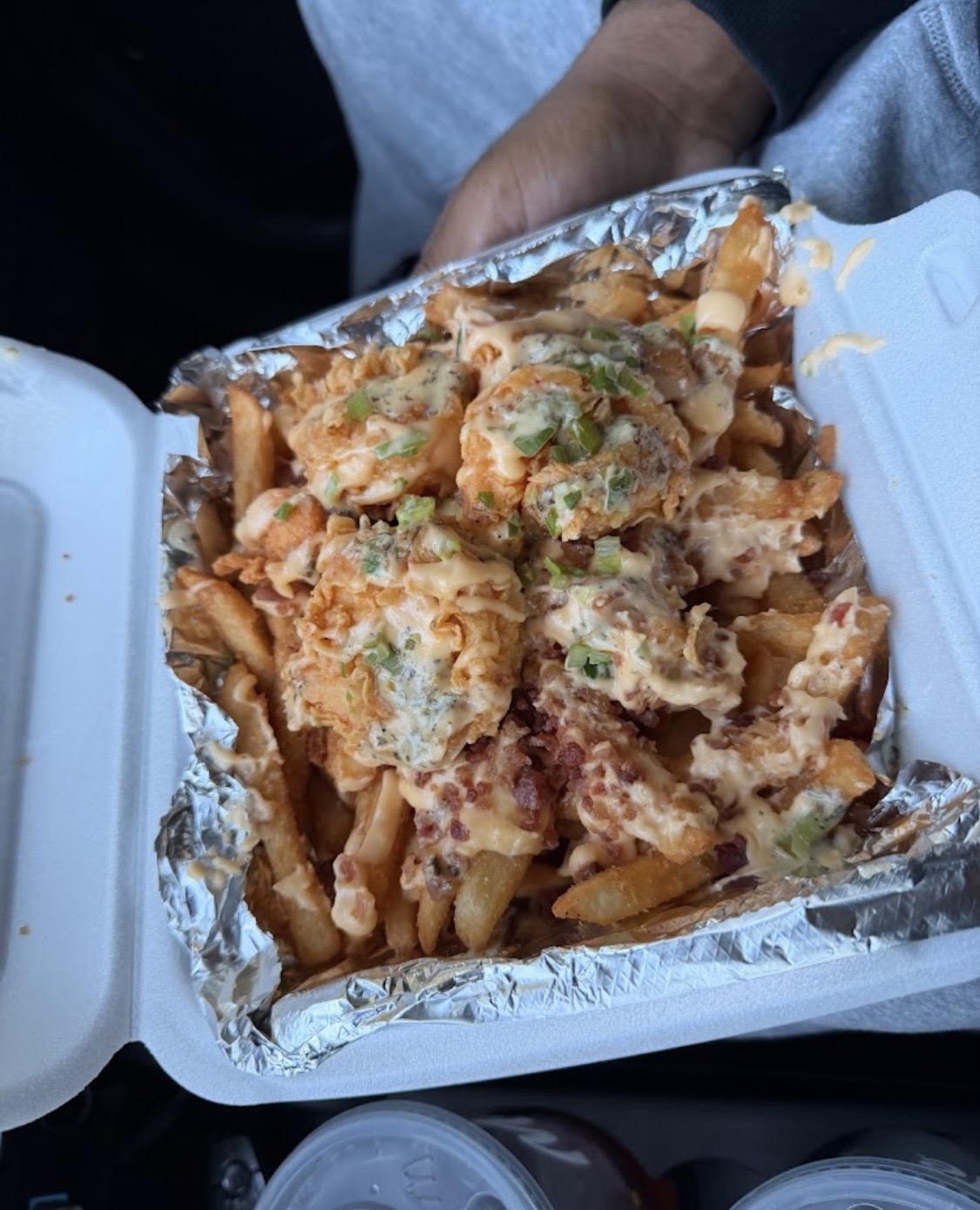 Shrimp loaded fries with bacon and garlic aioli
